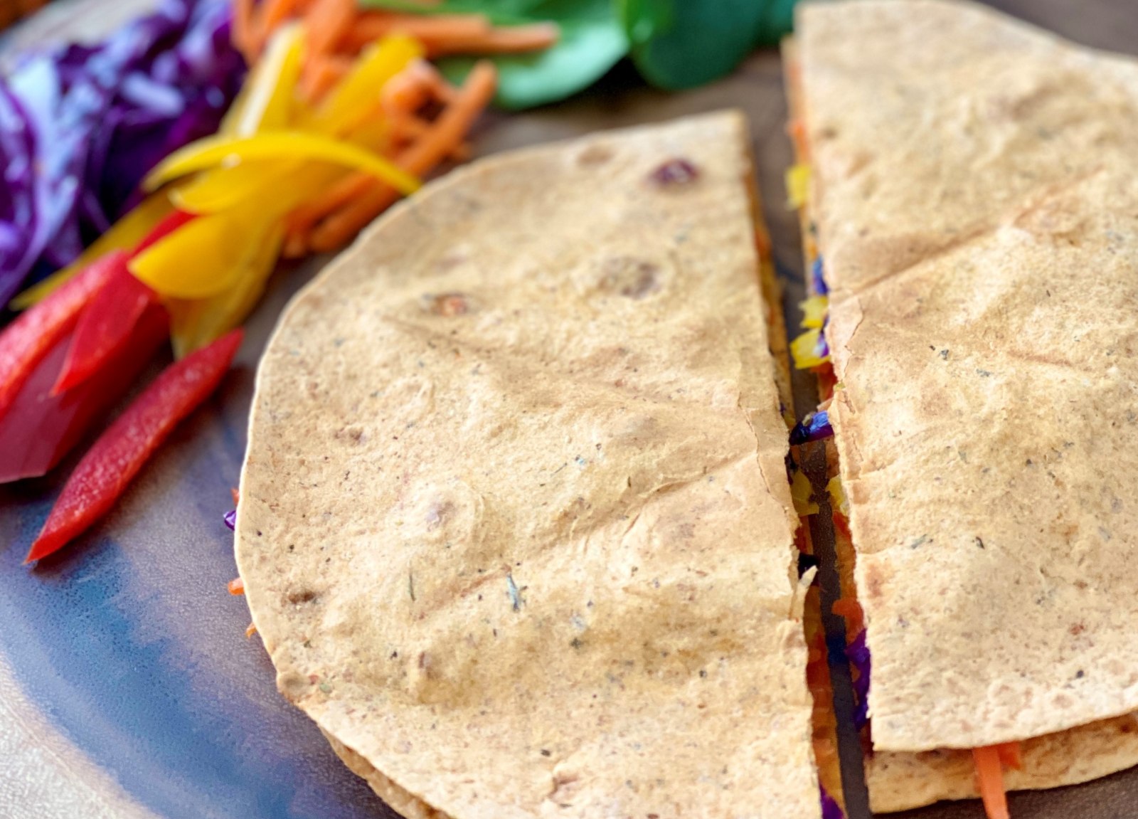 Looking for a  yummy but simple dinner for yourself or the whole family? This quesadilla is not only full of color but nutrients too!