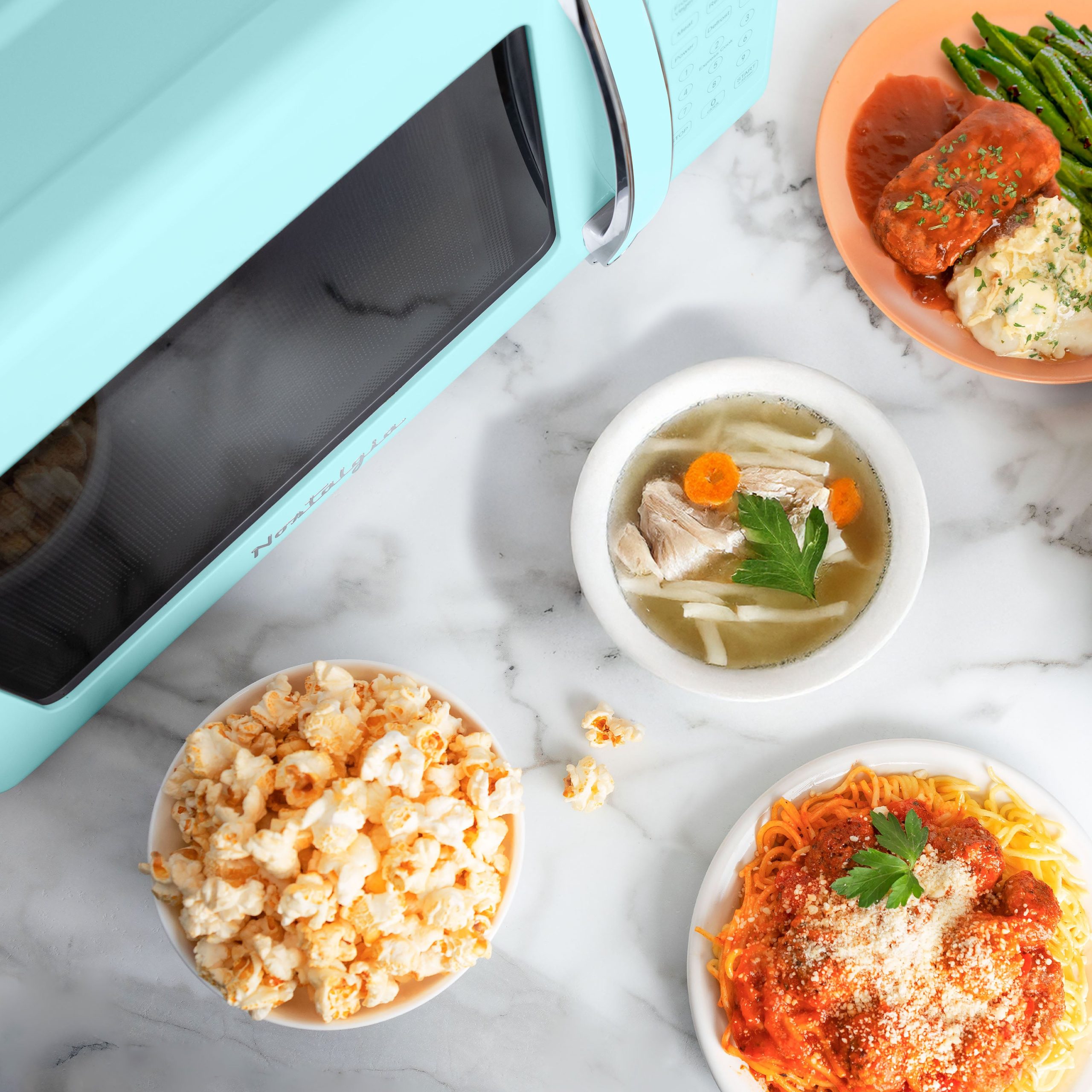 Nostalgia Retro 700W Microwave Oven – 0.7 Cu Ft Capacity - Image 10
